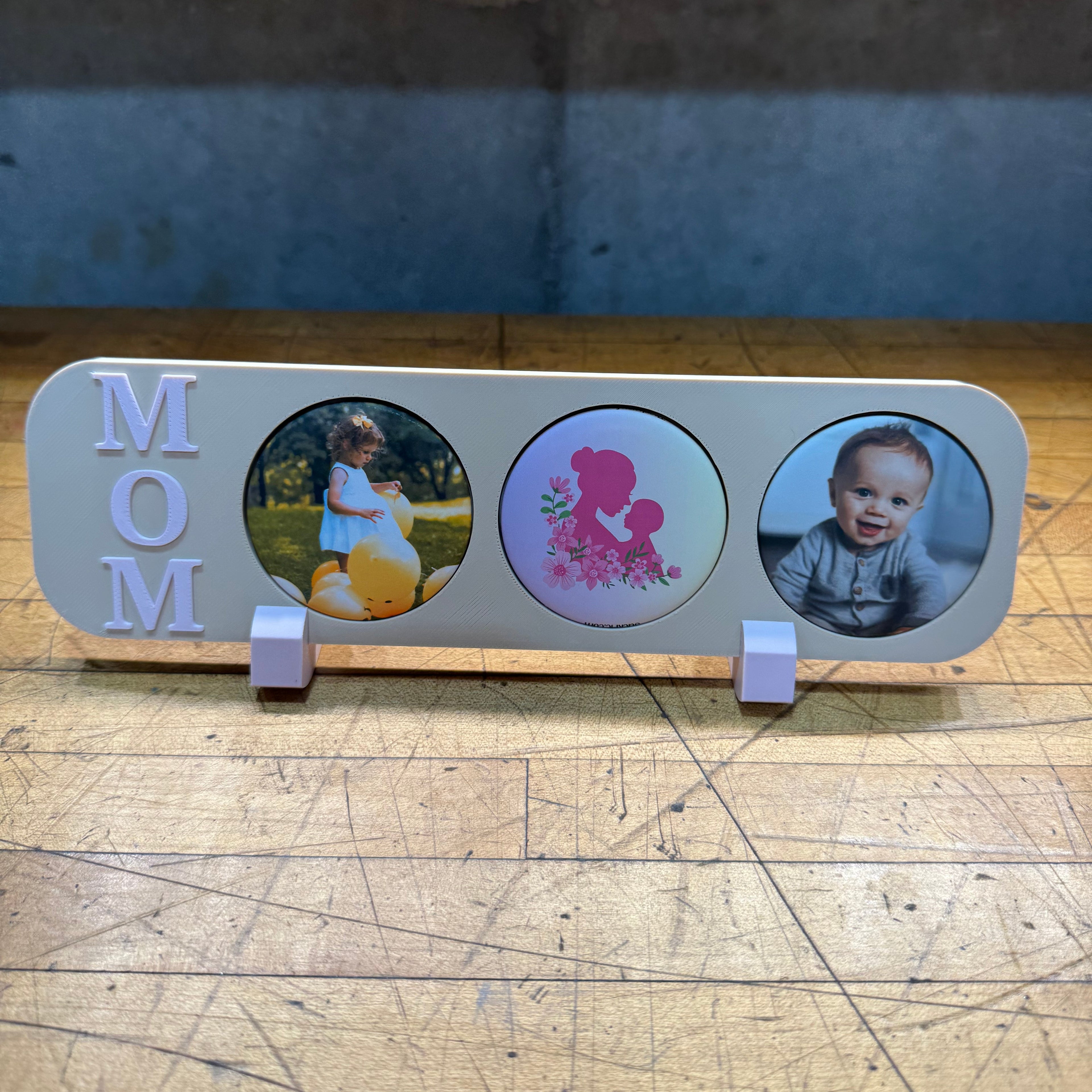 Personalized MOM magnetic photo frame displayed on table with family memory photo magnets by StickPic