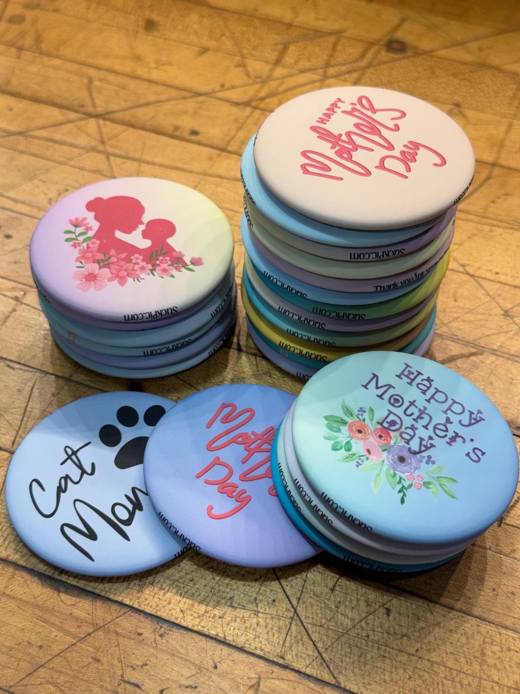 Family memories and custom text graphics displayed as custom photo magnets for gifting by StickPic